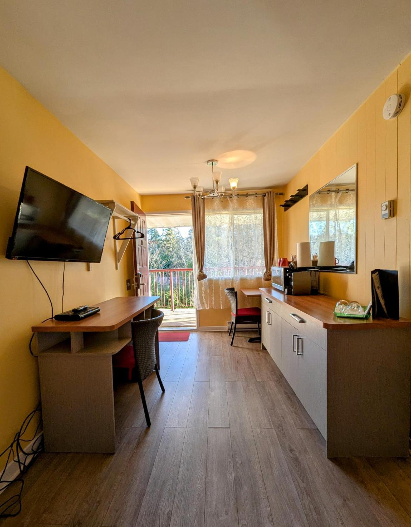 Motel Des Pentes Et Suites Saint-Sauveur Экстерьер фото